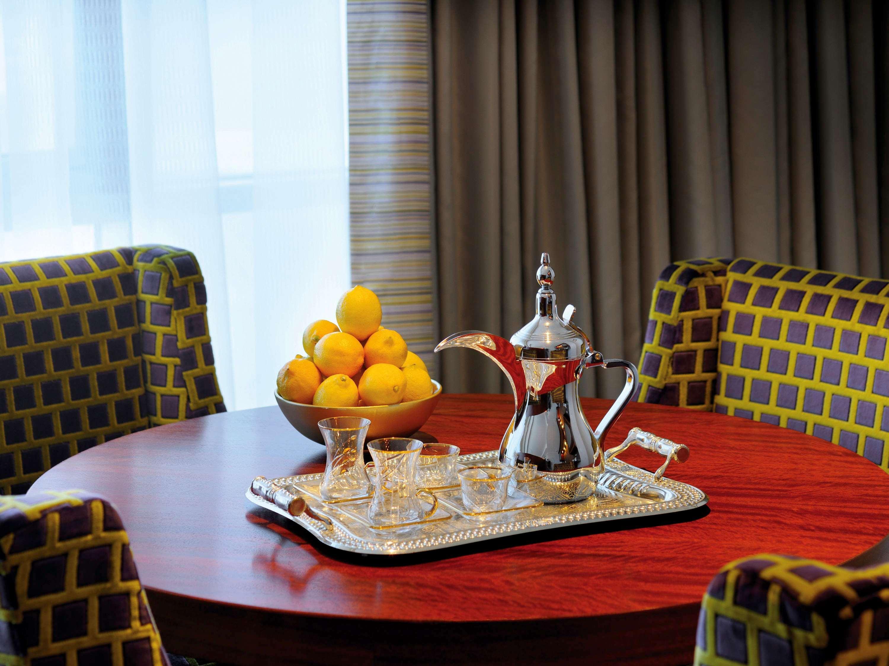 Mövenpick Hotel West Bay Doha Exteriör bild A traditional Arabic coffee pot