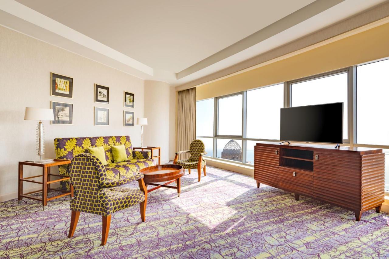 Mövenpick Hotel West Bay Doha Exteriör bild Living room