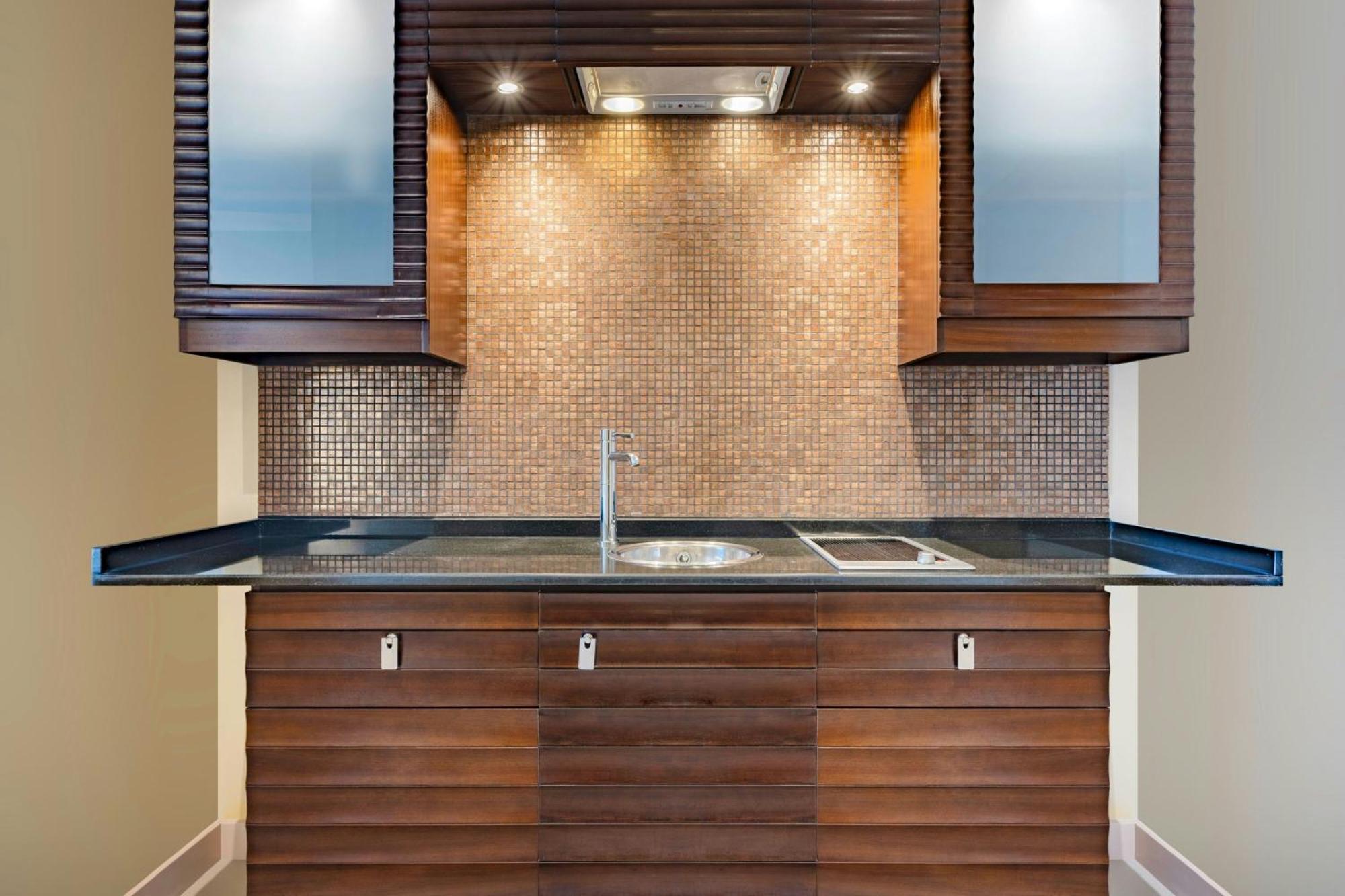 Mövenpick Hotel West Bay Doha Exteriör bild A kitchen with a single-bowl sink